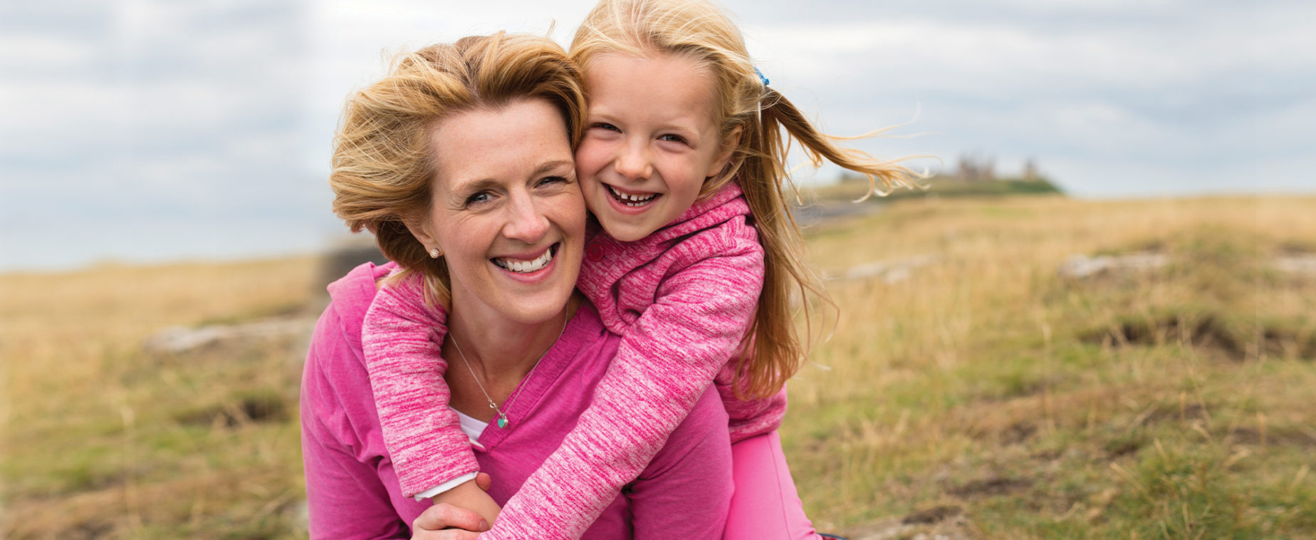 Woman and Daughter Embracing