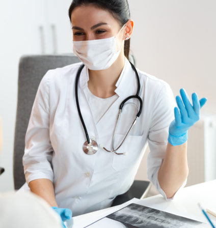 Masked Provider Seeing Patient